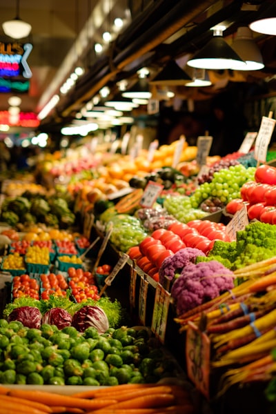 Reviews Market stall piled with fruit and vegetables